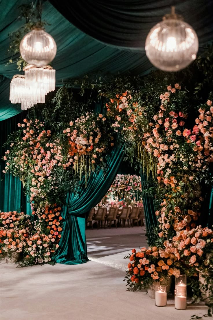 Floral arch and neon sign setup for a baby shower